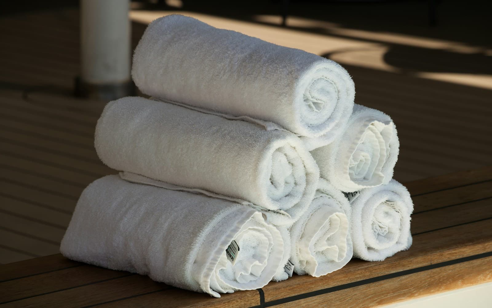 Premium towels on timber deck
